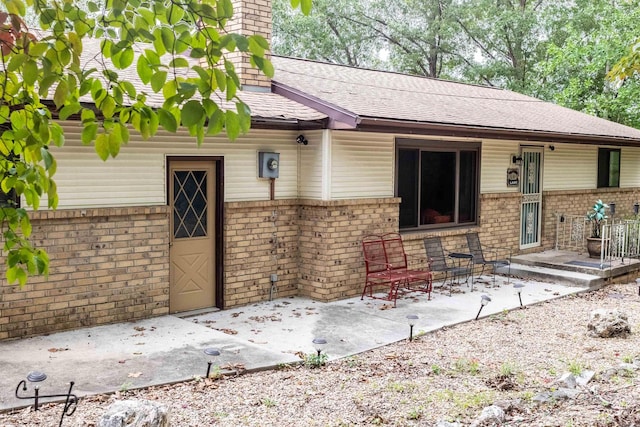 view of front of property featuring a patio