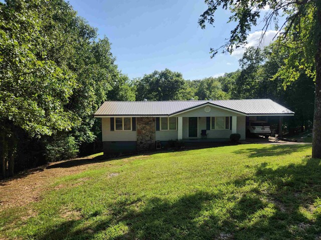 ranch-style house with a front yard