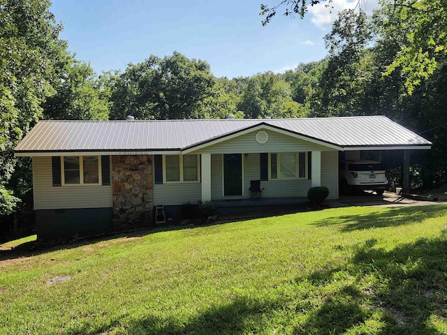 ranch-style house with a carport and a front yard