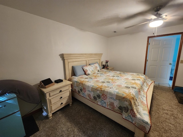 bedroom with dark colored carpet and ceiling fan