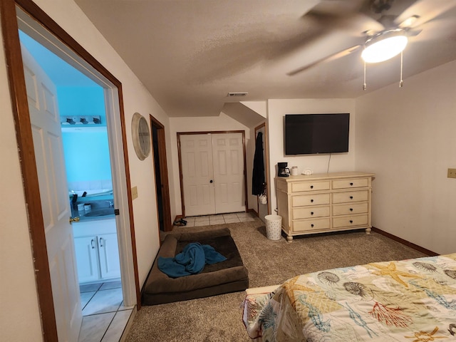 bedroom featuring ceiling fan and dark colored carpet