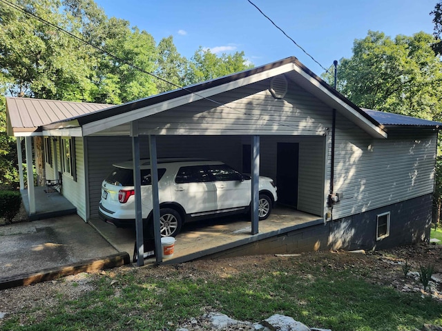 exterior space featuring a carport