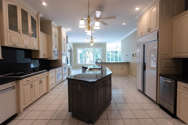 kitchen featuring light tile patterned flooring, black cooktop, a sink, ornamental molding, and dishwasher