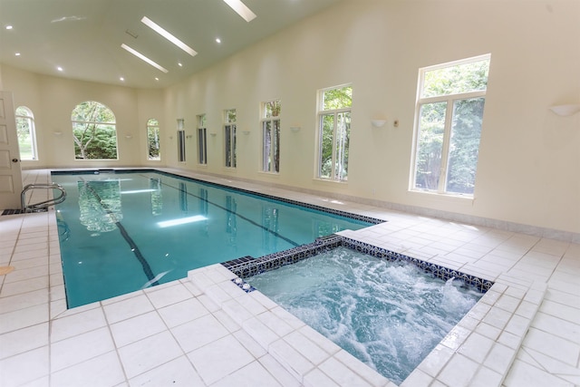 view of pool featuring a pool with connected hot tub