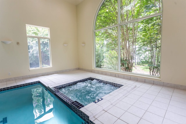 pool with an indoor hot tub