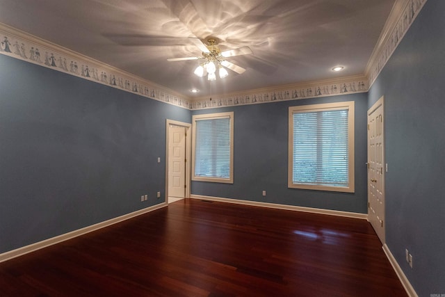 unfurnished room featuring ornamental molding, wood finished floors, a ceiling fan, and baseboards