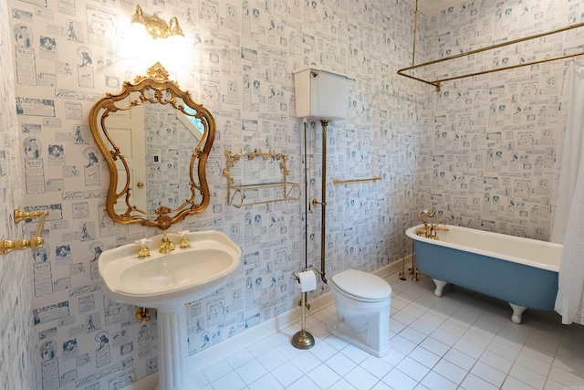 bathroom featuring a shower, a freestanding tub, toilet, and tile patterned floors