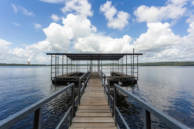 view of dock with a water view and boat lift