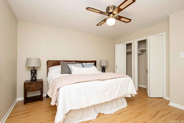 bedroom with light hardwood / wood-style floors and ceiling fan