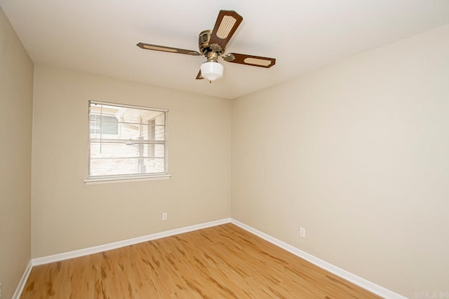 empty room with light wood-type flooring and ceiling fan