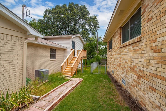 view of yard featuring central AC