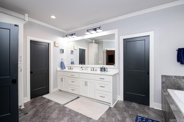 bathroom with tiled tub, vanity, tile patterned floors, and crown molding