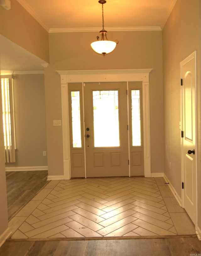 entryway featuring light hardwood / wood-style flooring and ornamental molding