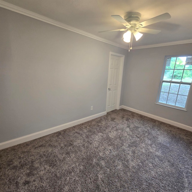 carpeted spare room with ornamental molding and ceiling fan