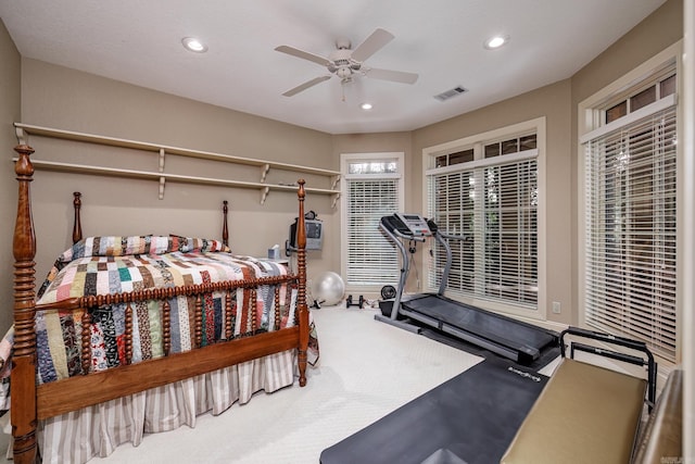 bedroom with recessed lighting, visible vents, carpet floors, and ceiling fan