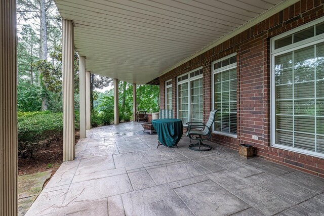 view of patio featuring a porch