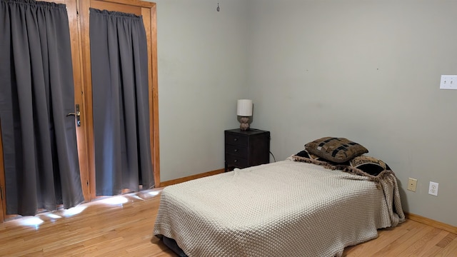 bedroom featuring light hardwood / wood-style floors