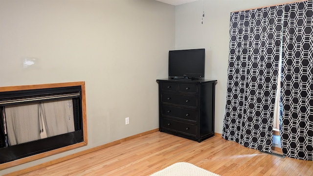 living room with hardwood / wood-style flooring