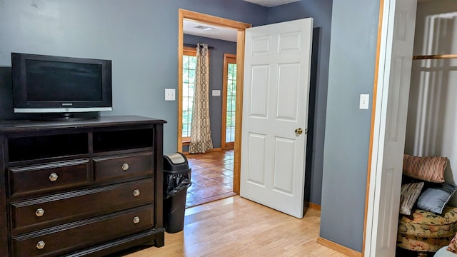 bedroom with light wood-type flooring