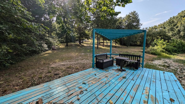 wooden deck featuring a pergola