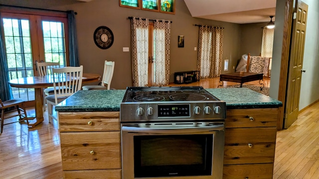 kitchen featuring light hardwood / wood-style floors and stainless steel stove