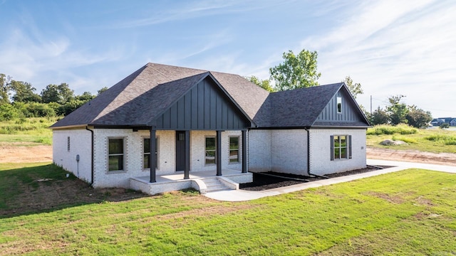 view of front of home with a front yard