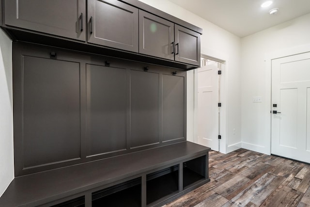 mudroom with dark hardwood / wood-style floors