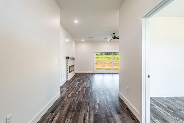 hallway with dark hardwood / wood-style floors