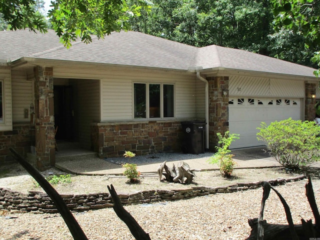 ranch-style home with a garage