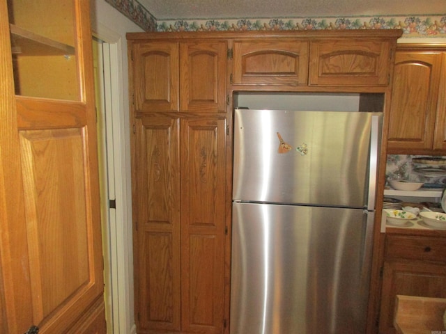 kitchen featuring stainless steel fridge