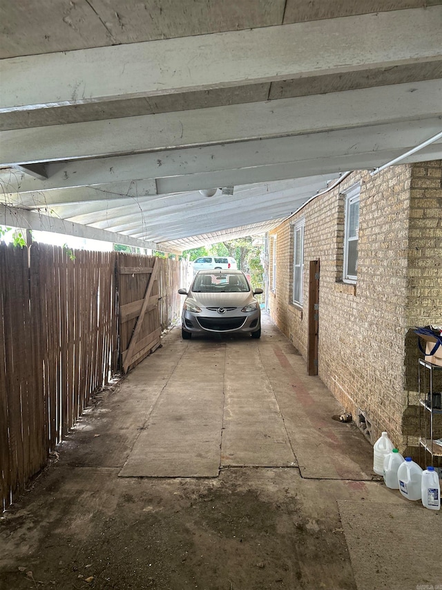 garage with a carport