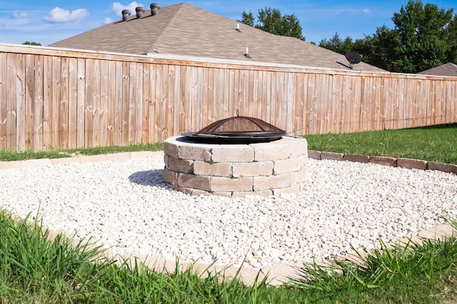 view of patio featuring a fire pit