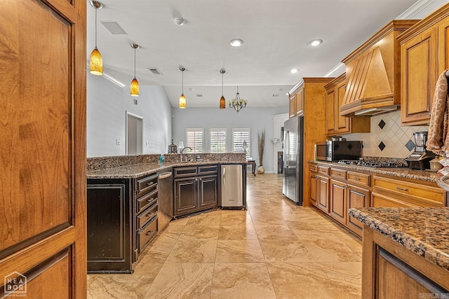 kitchen featuring stainless steel appliances, decorative light fixtures, decorative backsplash, light tile patterned flooring, and custom range hood