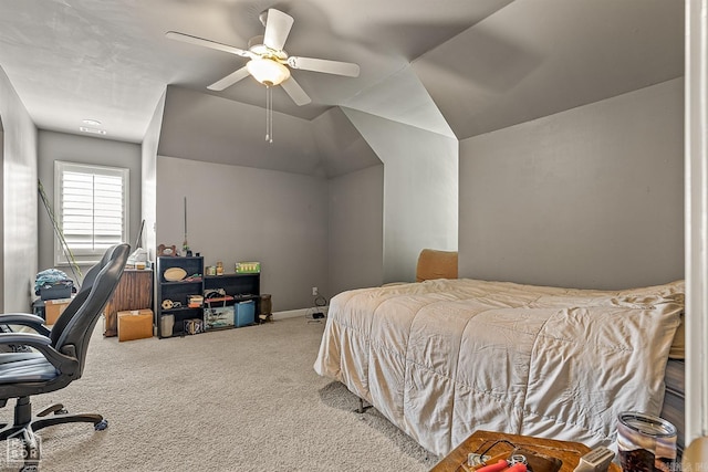 carpeted bedroom with lofted ceiling and ceiling fan