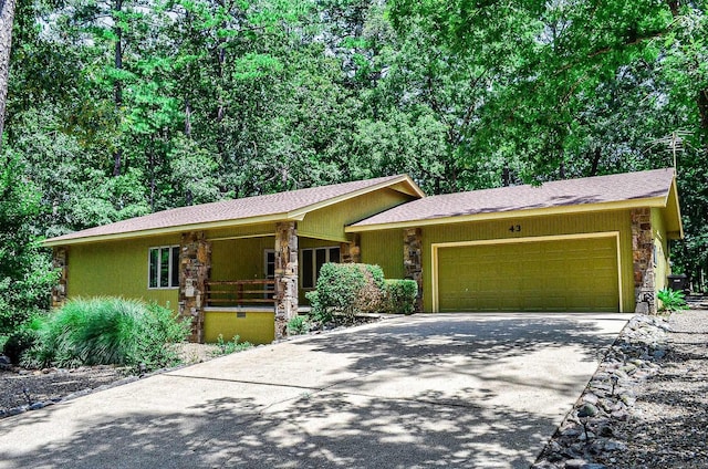 single story home with a garage