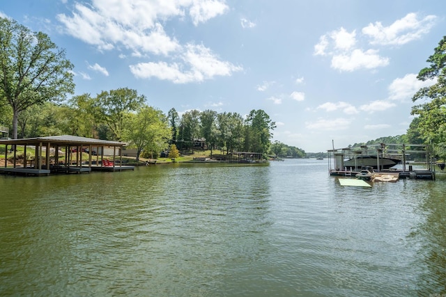 dock area featuring a water view and boat lift