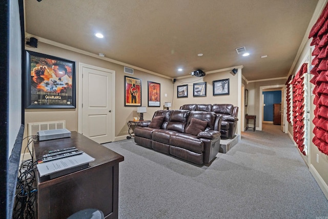 home theater room with carpet floors, ornamental molding, recessed lighting, and baseboards