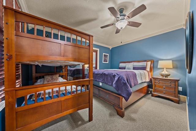 carpeted bedroom with a ceiling fan, crown molding, and a textured ceiling