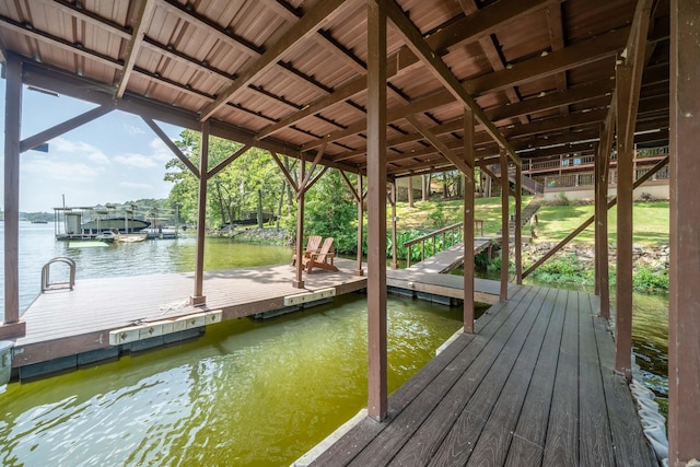 view of dock with a water view