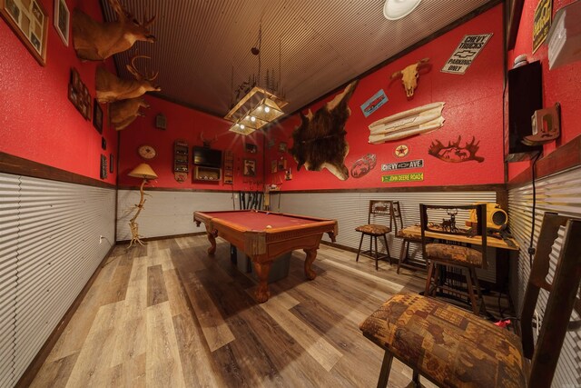 game room featuring pool table, light hardwood / wood-style flooring, and wood ceiling