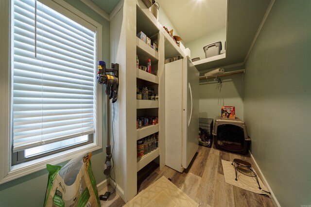 interior space featuring independent washer and dryer and light wood-type flooring