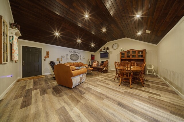 living room with vaulted ceiling, wood ceiling, light wood-type flooring, and ornamental molding