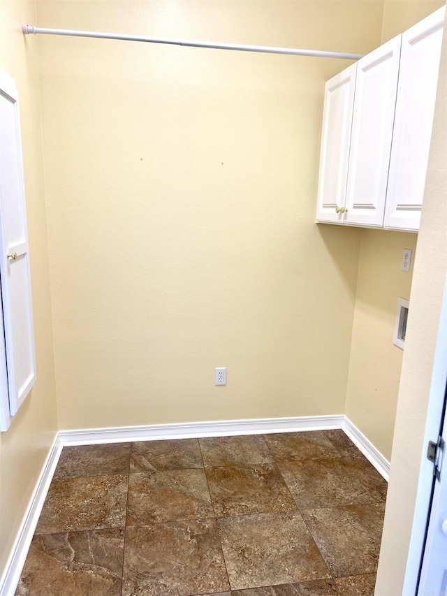 laundry room with cabinets and hookup for a washing machine