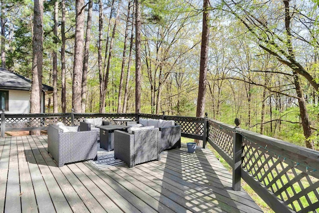 deck featuring outdoor lounge area