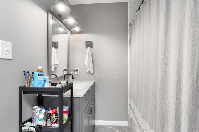 bathroom with vanity and tile patterned flooring