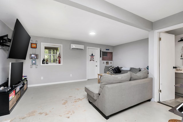 living room featuring a wall mounted AC and concrete flooring