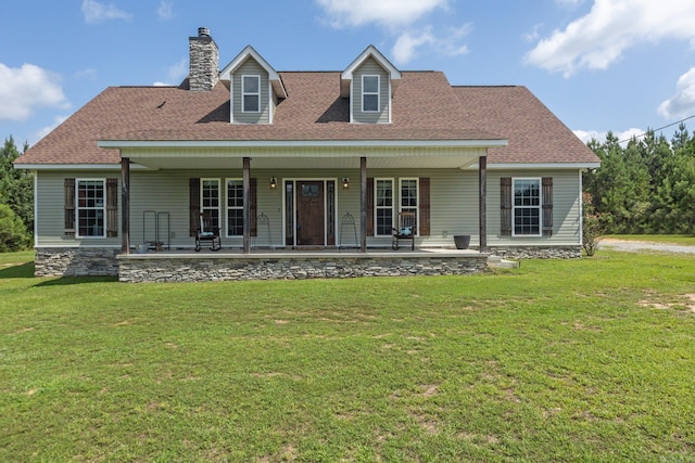 cape cod home featuring covered porch and a front yard