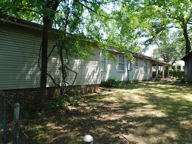 view of property exterior featuring a yard