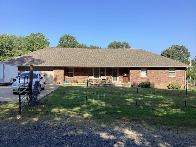 single story home with a porch and a front yard