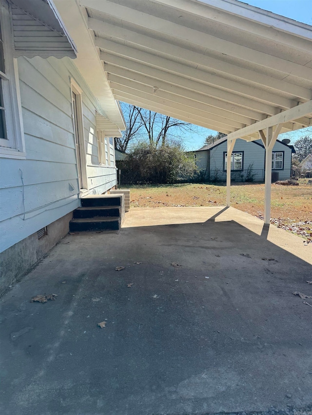 view of patio featuring a carport